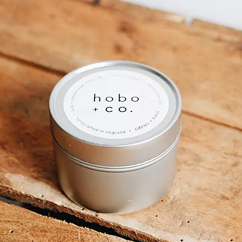 Vegan soy wax tin candle in citrus and basil. Shop as part of our build a box collection