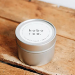 Load image into Gallery viewer, Vegan soy wax tin candle in citrus and basil. Shop as part of our build a box collection
